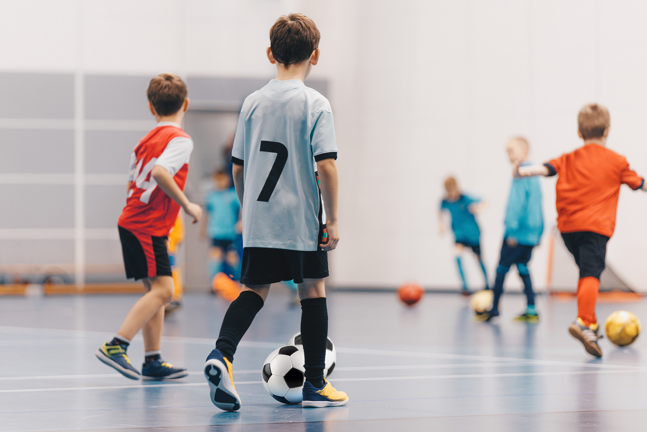 Futsal Boys in Training Game. Kids Play Indoor Soccer Practice Match. School Children Have Fun in Physical Education Class